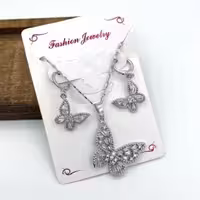 نیم ست طرح پروانه نگین دار نقره ای