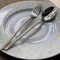 سرویس قاشق و چنگال نیمه طلایی 120 پارچه شیاردار یونیک