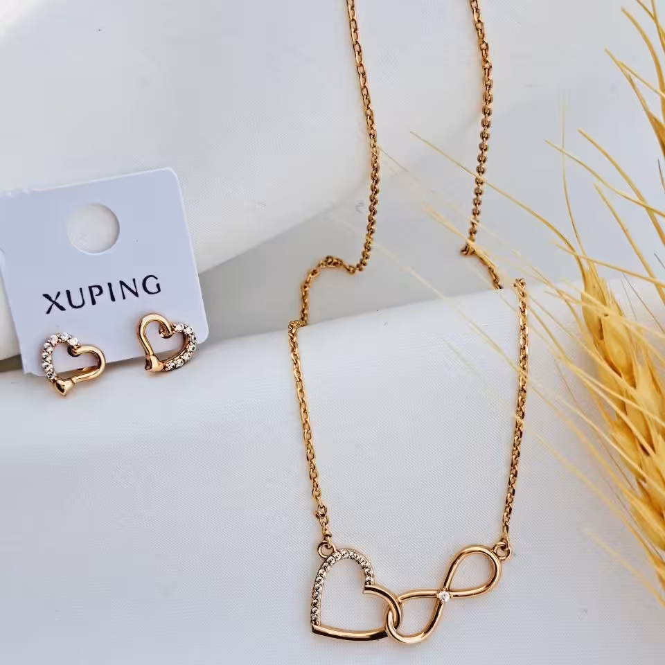 ست پلاک و زنجیر و گوشواره بینهایت و قلب از برند ژوپینگ