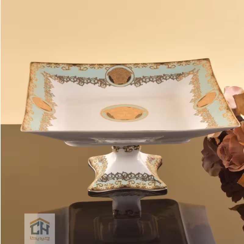 شیرینی خوری چینی پایه دار طرح ورساچه فیروزه ای مدل WP081M