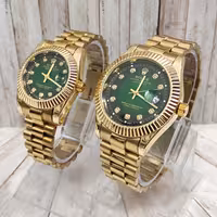 ساعت ست زنانه و مردانه رولکس های کپی درجه یک طلایی زمینه سبز ارسال رایگان