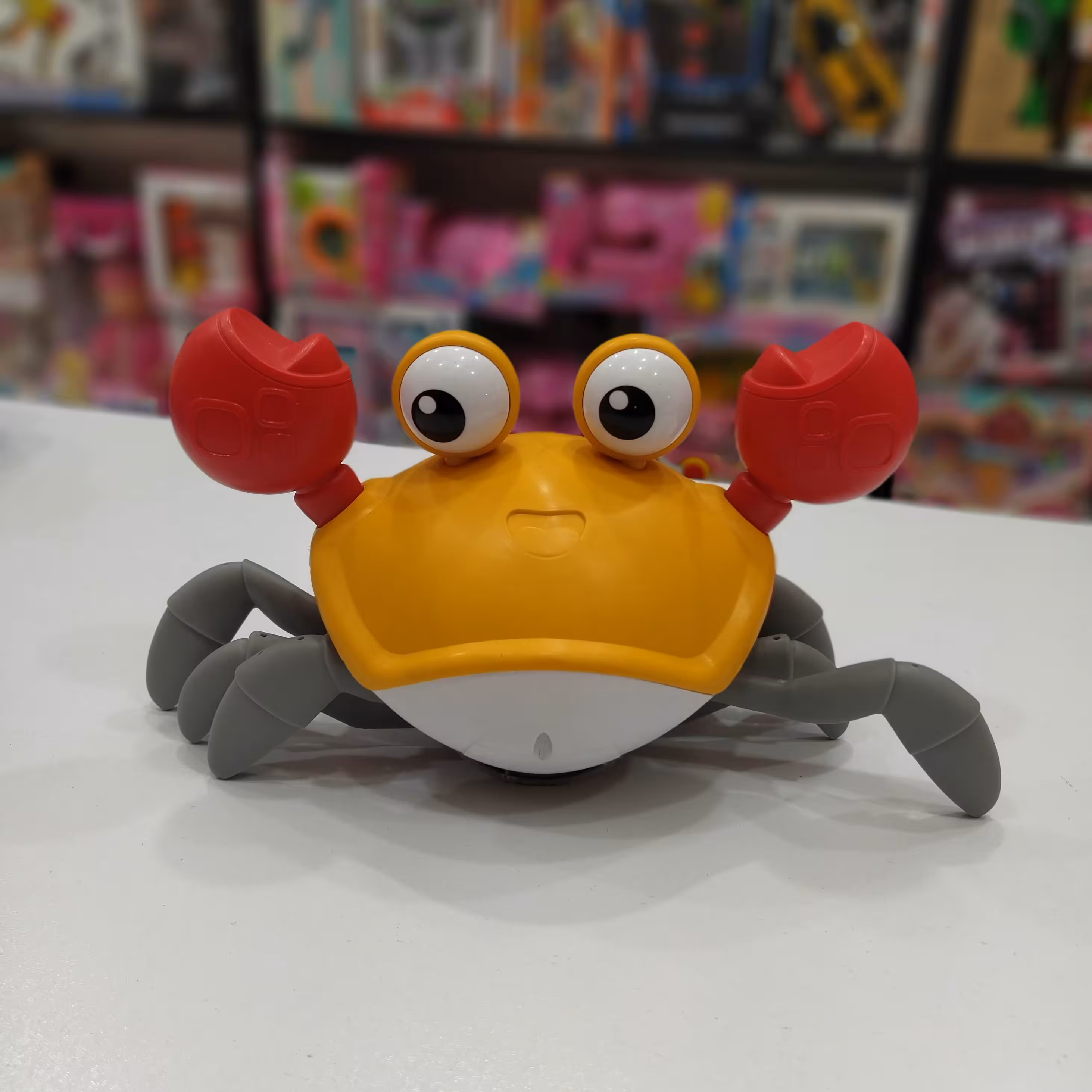 اسباب بازی خرچنگ موزیکال شارژی و دارای سنسور مانع و کابل شارژUSB کد QC-1Y