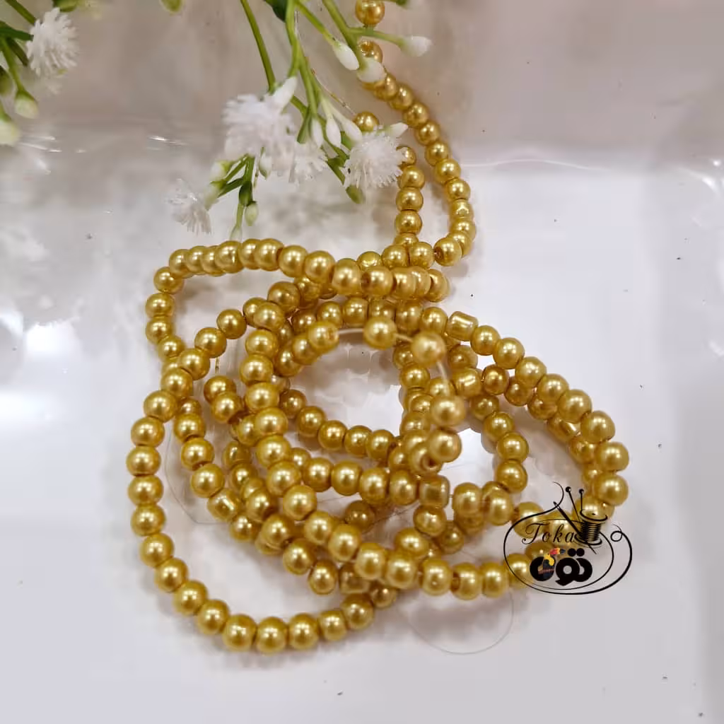 مروارید سنگی طلایی