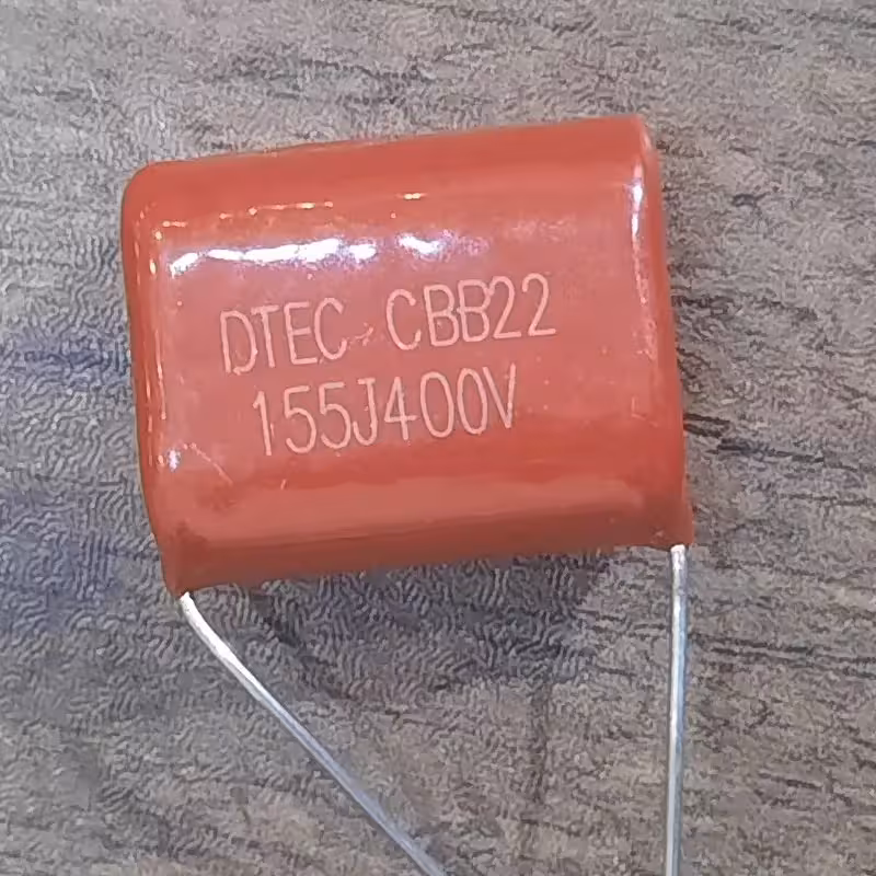 خازن پلی استر400ولت155J-cbb22