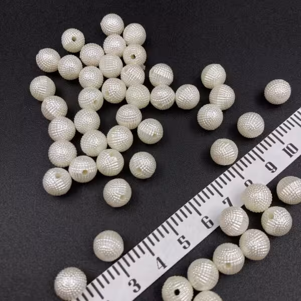 مروارید تمشکی سایز 10 پرس جدید  ( بسته 50 عددی )