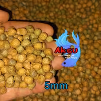 غذای ماهی  5میل گرانول انرژی   بیومار روابی اکسو استا و اسپیرو گوشتخوار و گیاه خوار یک کیلویی
