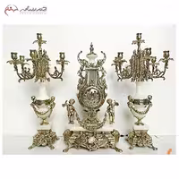 ست ساعت و شمعدان، برنزی و سیاه قلم پر کار، با پایه سنگی مدل (سلطنتی)، چشم نواز