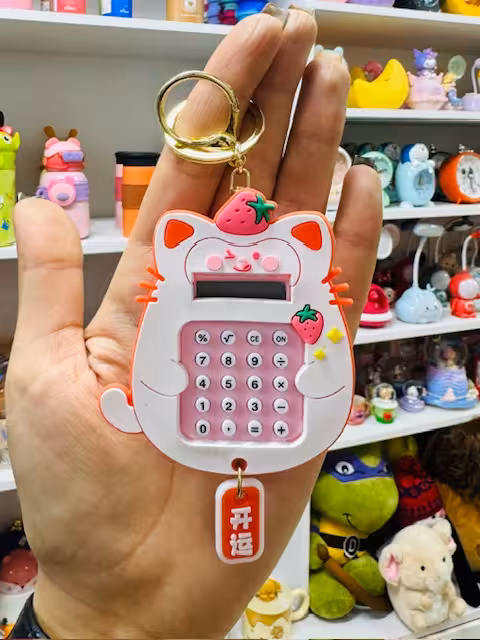 جاکلیدی ماشین حساب دار طرح گربه توت فرنگی 2