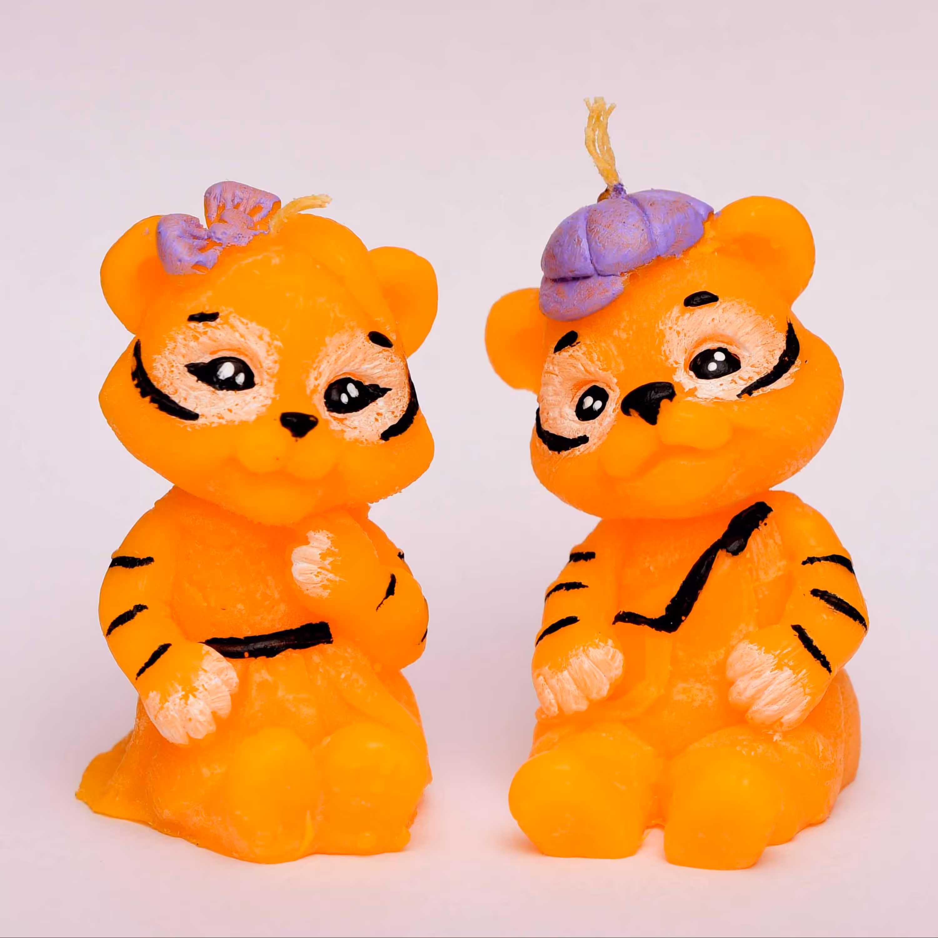 شمع طرح ببر مجموعه 2 عددی دختروپسرکلاه دار رنگ نارنجی