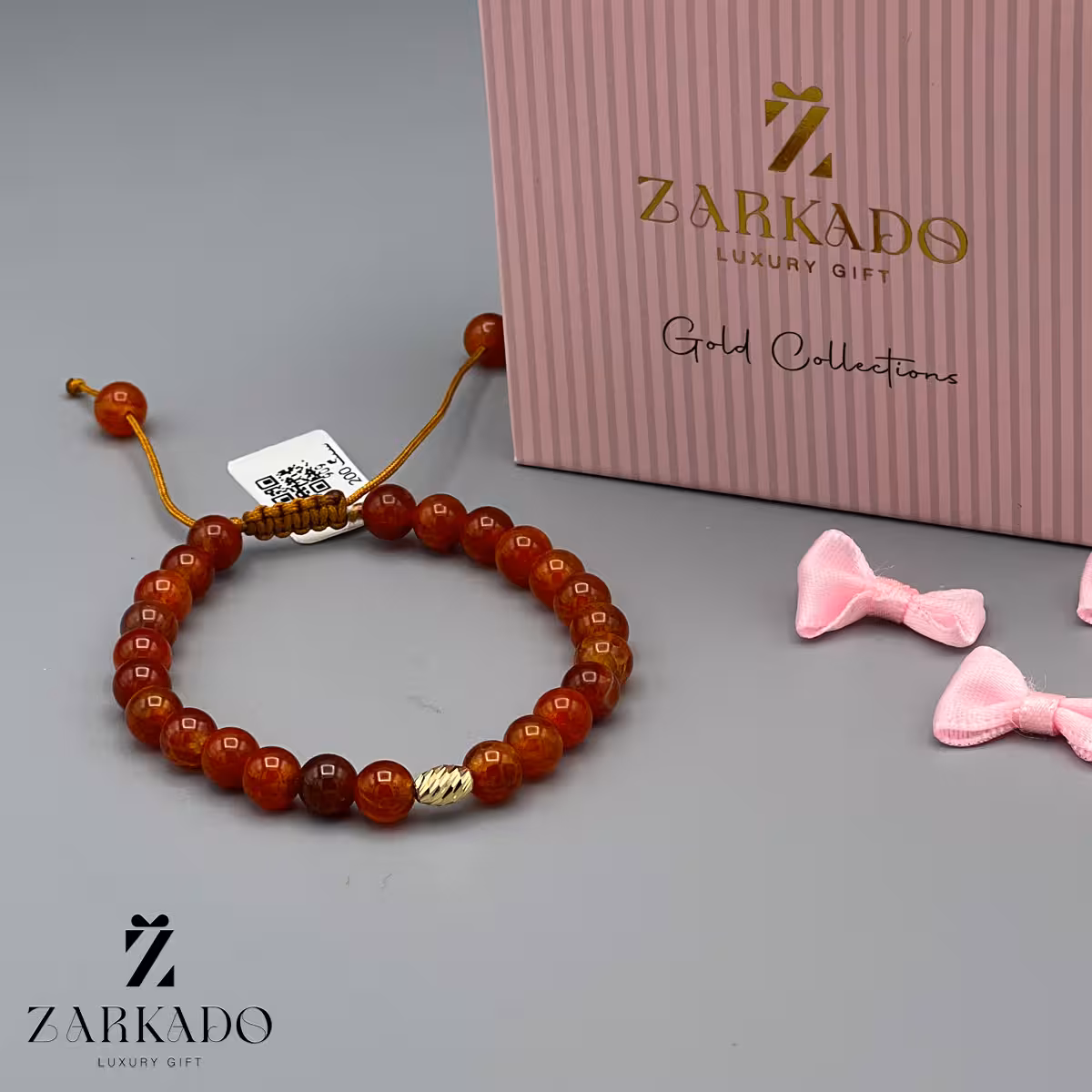 دستبند سنگی قهوه ای با مهره طلای بیضی کد B909