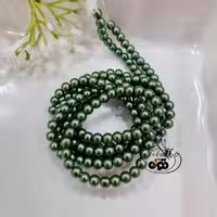 مروارید سنگی سبز تیره