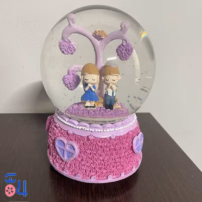 گوی شیشه ای صورتی موزیکال دختر و پسر