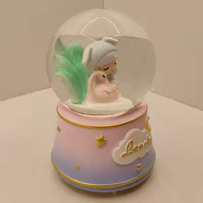 گوی موزیکال مدل  پمپی دختر مهربون و قو