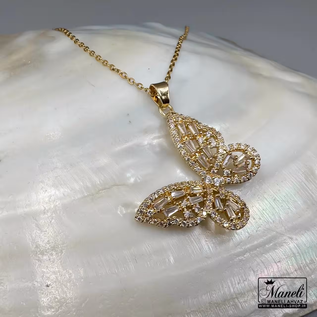 خرید گردنبند پروانه استیل طلایی با نگین باگتی|14040463