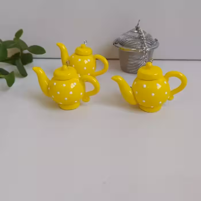 آویز صافی طرح قوری مناسب برای صافی چای بدون صافی استیل می باشد | amazonchi