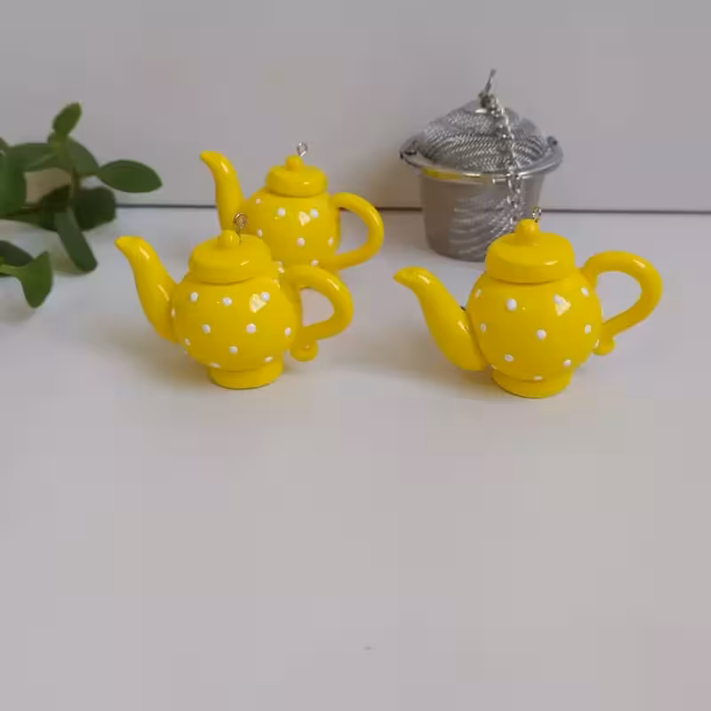 آویز صافی طرح قوری مناسب برای صافی چای بدون صافی استیل می باشد | amazonchi