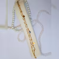 دستبند تیفانی دوردیفه آویزدار چشم نظر با سکه ریز استیل رنگ ثابت 