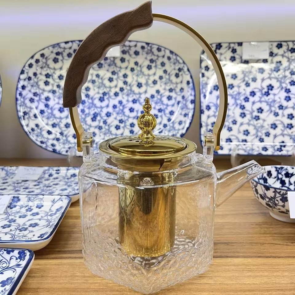 قوری پیرکس دسته چوب استیل طلایی 1000 میل مدل پایین برفی