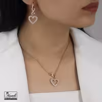 نیم ست طرح قلب و بینهایت ژوپینگ – طلایی و نقره‌ای نگین دار 14030317