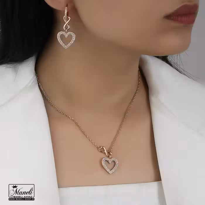 نیم ست طرح قلب و بینهایت ژوپینگ – طلایی و نقره‌ای نگین دار 14030317