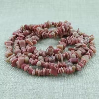 ریسه سنگ رودونیت صورتی شکسته (طول ریسه 40 سانتیمتر است)