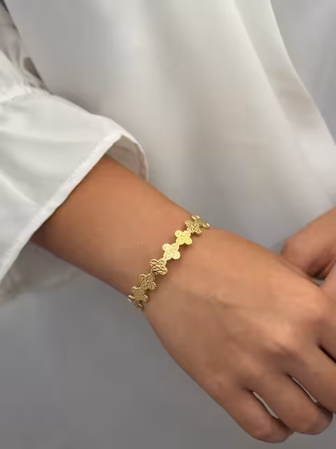 بنگل زنانه طرح ونکلیف جنس برنج با آبکاری طلا  فیری سایز رنگ طلایی-نقره ای