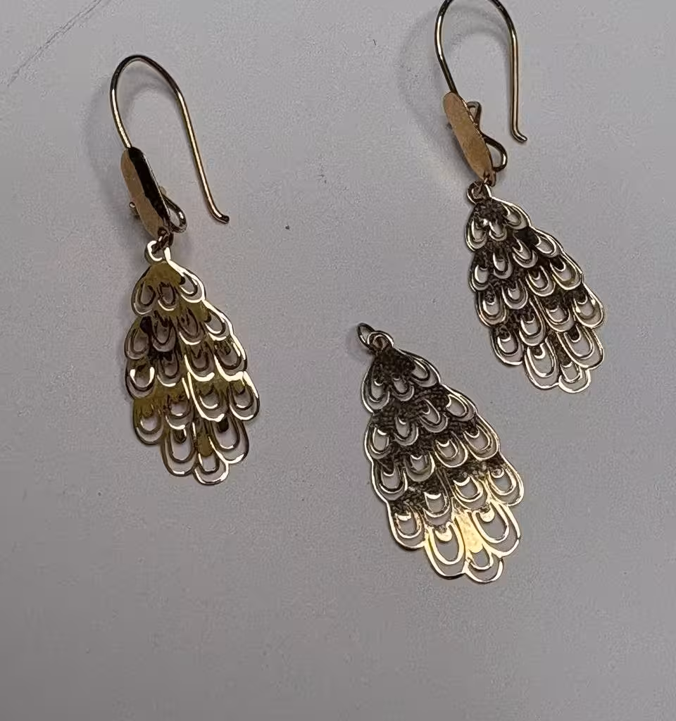 نیم ست طلا طرح طاووس وزن 1/91 گرم