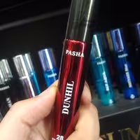 عطر جیبی مردانه پاشا رایحه دانهیل حجم 22 میل