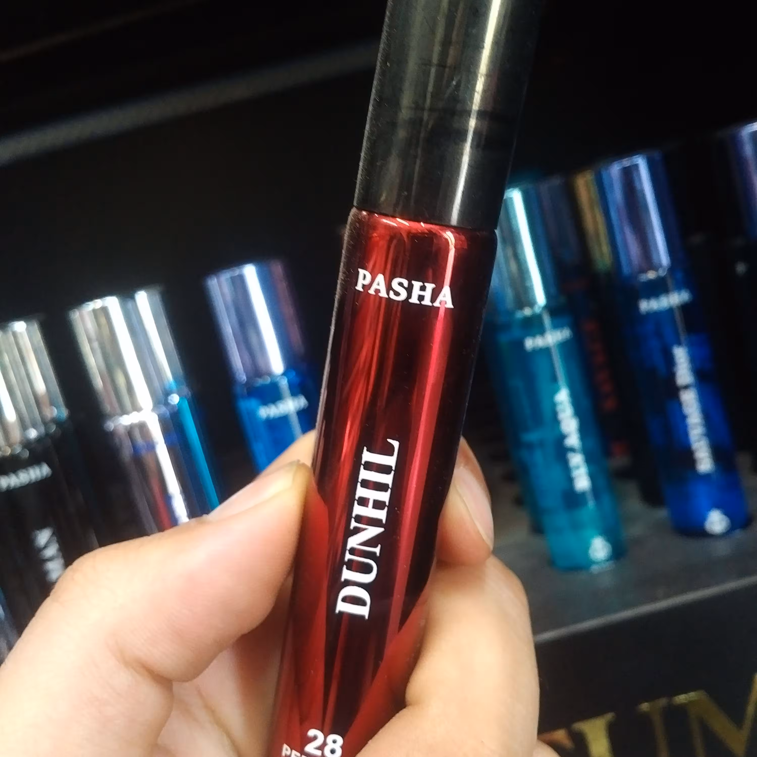 عطر جیبی مردانه پاشا رایحه دانهیل حجم 22 میل