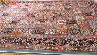 فرش ماشینی زمرد مشهد طرح خشتی مدل ترنج زمینه آبی