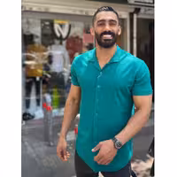 پیراهن یقه انگلیسی پارچه کشی راه راه برند آرشید کار خوب