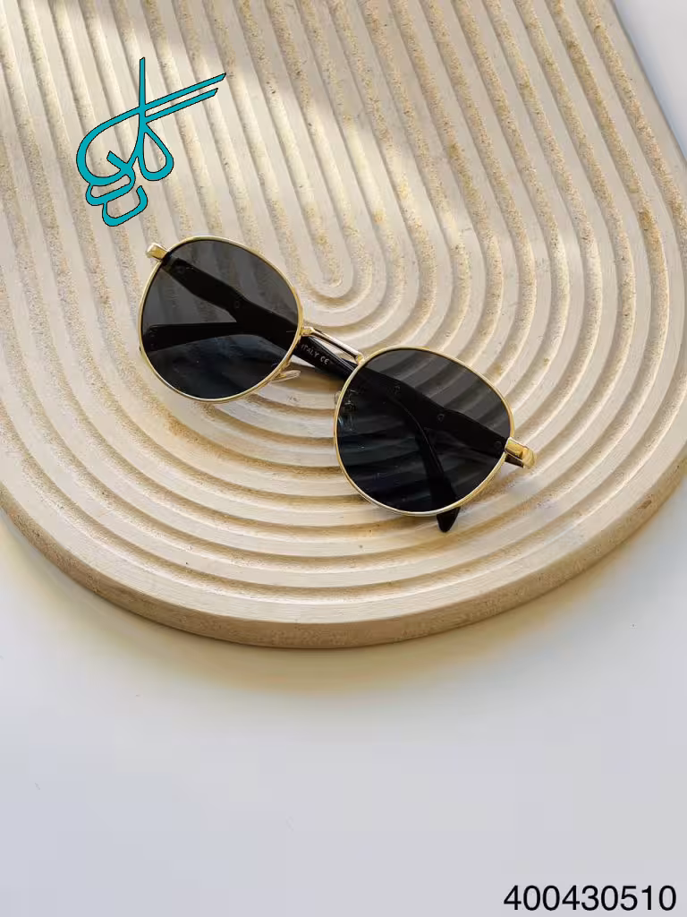 خرید عینک اسپرت مشکی طلایی برند PRADA دارای استاندراد UV400 فرم فلزی همراه کاور و دستمال کد 2415340 - ردگل