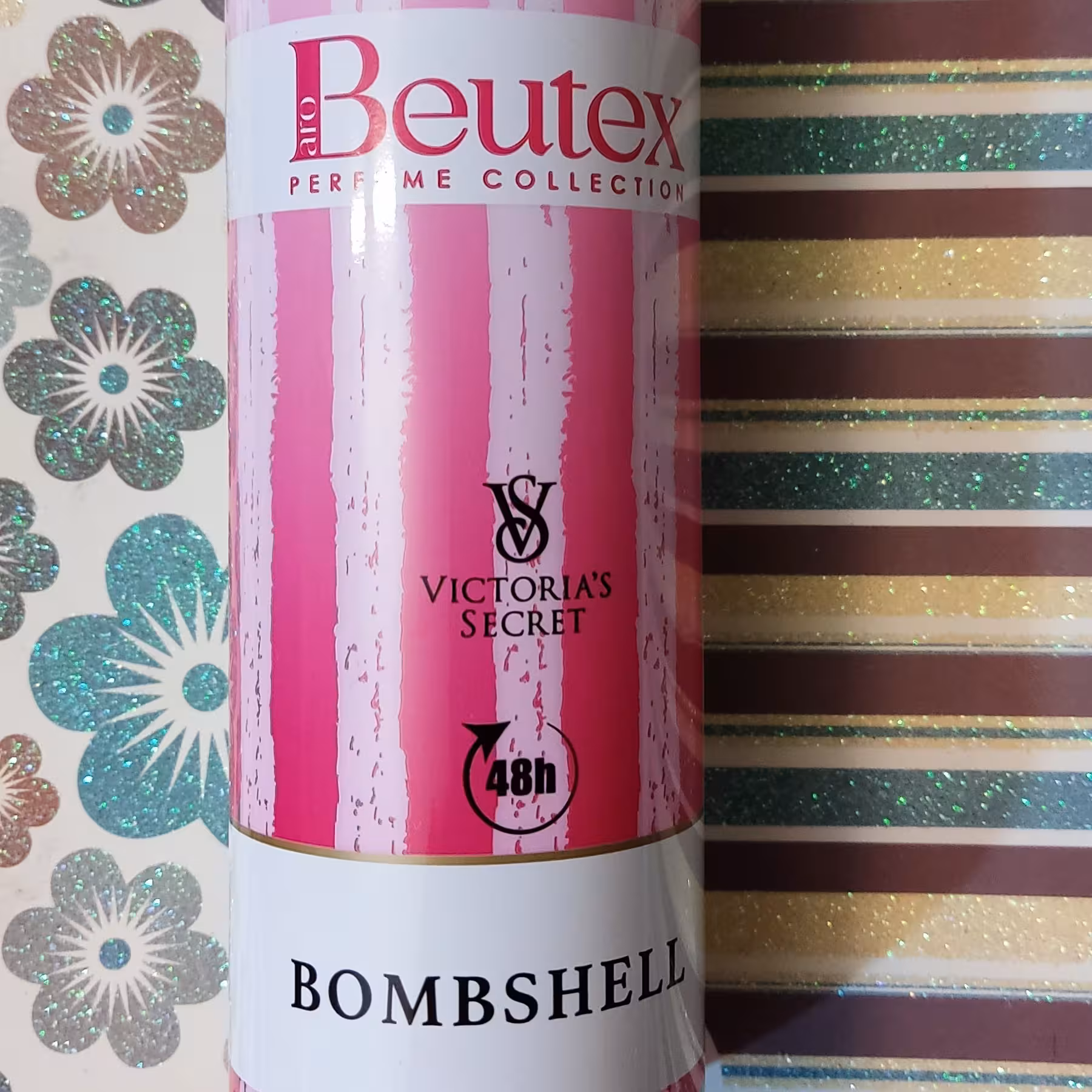 اسپری بدن زنانه BOMBSHELL(بامبشل) 200میل برند بیوتکس با ماندگاری 48 ساعت