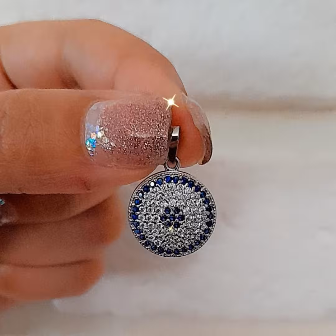 پلاک نقره طرح چشم نظر  با ابکاری طلا سفید به صورت رادیوم 