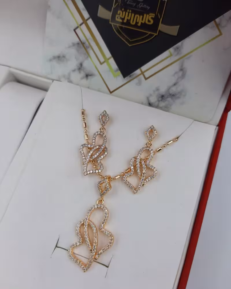 نیم ست گردنبند و گوشواره شوپینگ طرح قلب