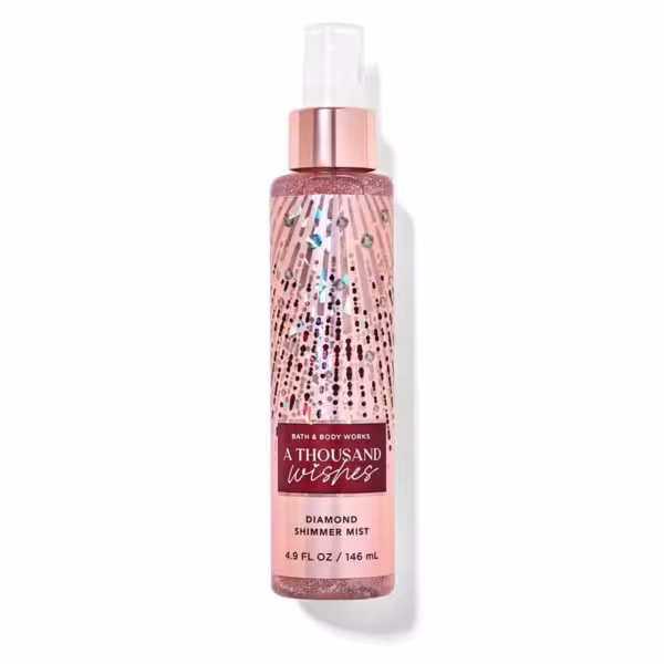 خوشبو کننده بدن bath & body works  مدل A thousand wishes  دارای رایحه ای ملایم  شیمر بدن ( دارای اکلیل های ریز )  حجم 146 میل ساخت آمریکا