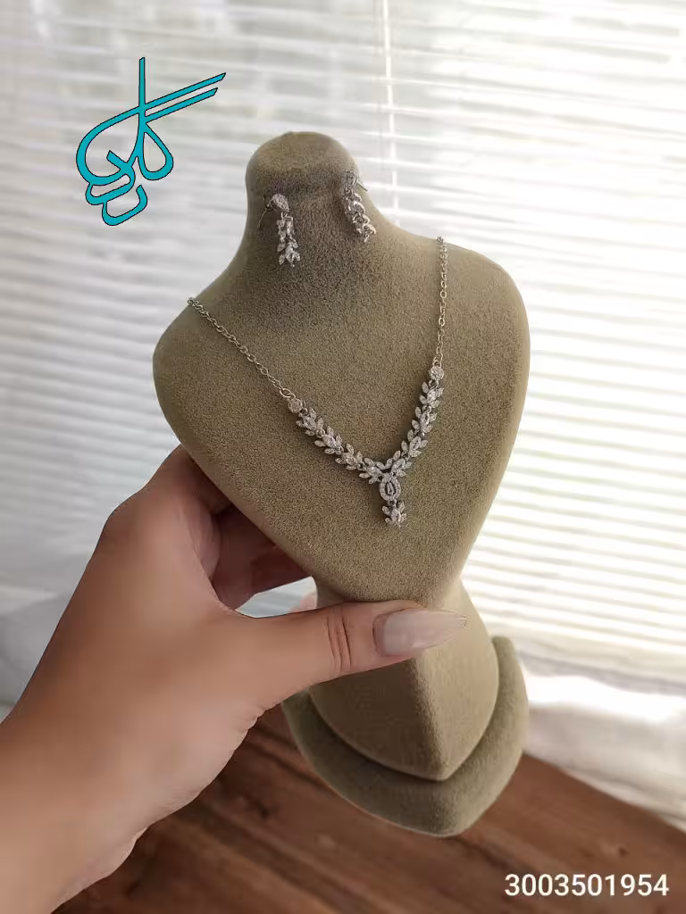 خرید نیمست جواهری زنانه با درخشش بی‌نظیر و طراحی ظریف نقره ای رنگ ثابت کیفیت عالی کد 1715545 - ردگل