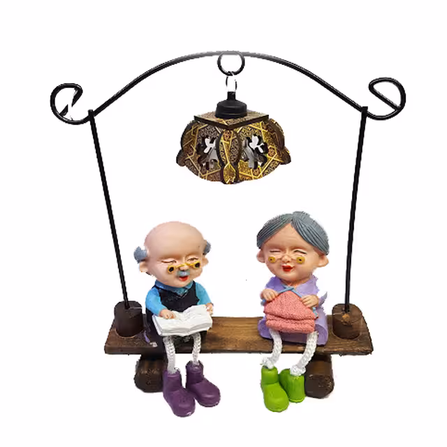 مجسمه طرح پیرمرد و پیرزن روی نیمکت کد m1012