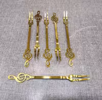 چنگال دسر نت موسیقی طلایی