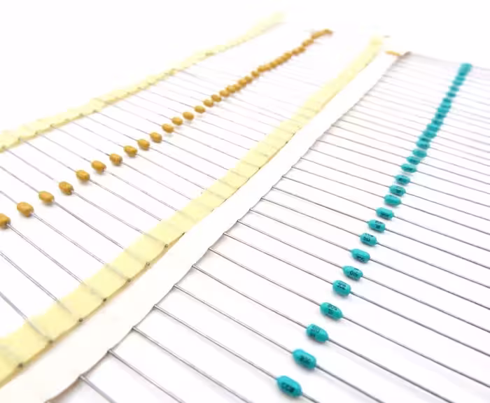 خازن مولتی لیر  100nF 50V Axial  (بسته 10 عددی)