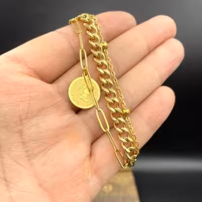 دستبند استیل اویزدار طلایی