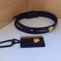 ست دستبند و گردنبند ورساچه اسپرت مشکی طلایی