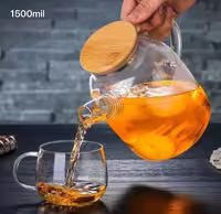 قوری پیرکس با درب چوبی بامبو، مناسب برای دم کردن چای.