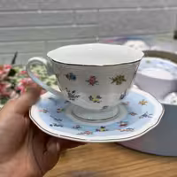 ست چایخوری 12 پارچه گل‌دار کد 6114 | فنجان و نعلبکی چینی طرح گل‌های ریز