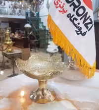 کاسه پایه دار برنجی هندی طاووس قلعه 10 سانت