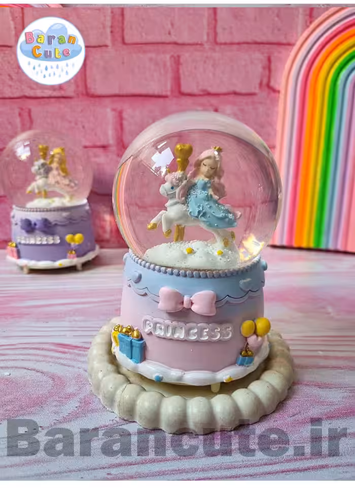 گوی موزیکال پمپی برفی چراغ دار سایز بزرگ طرح پرنسس مو صورتی