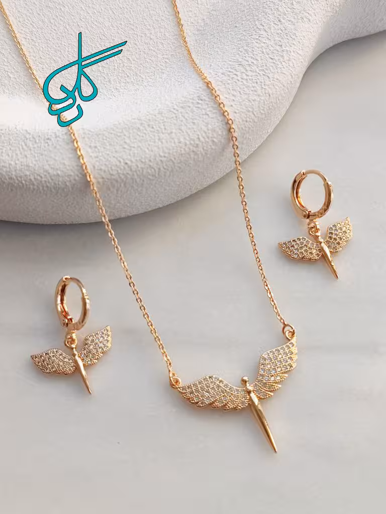 خرید نیم ست زنانه طرح فرشته بالدار مارک YSX کیفیت عالی رنگ ثابت همراه با زنجیر کد 1715591 - ردگل