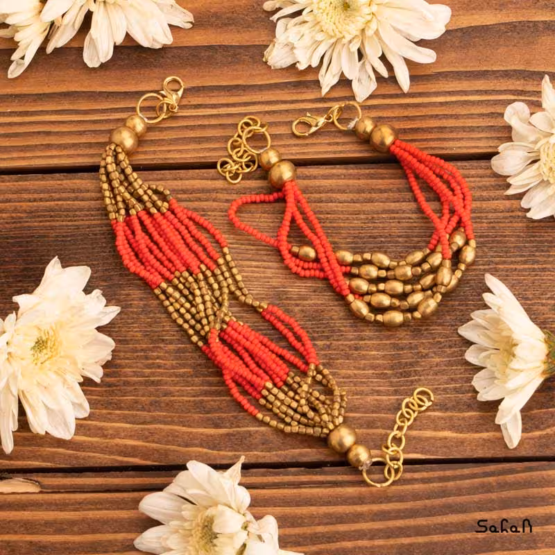 دستبند برنجی قرمز منجوق مدل شمیم