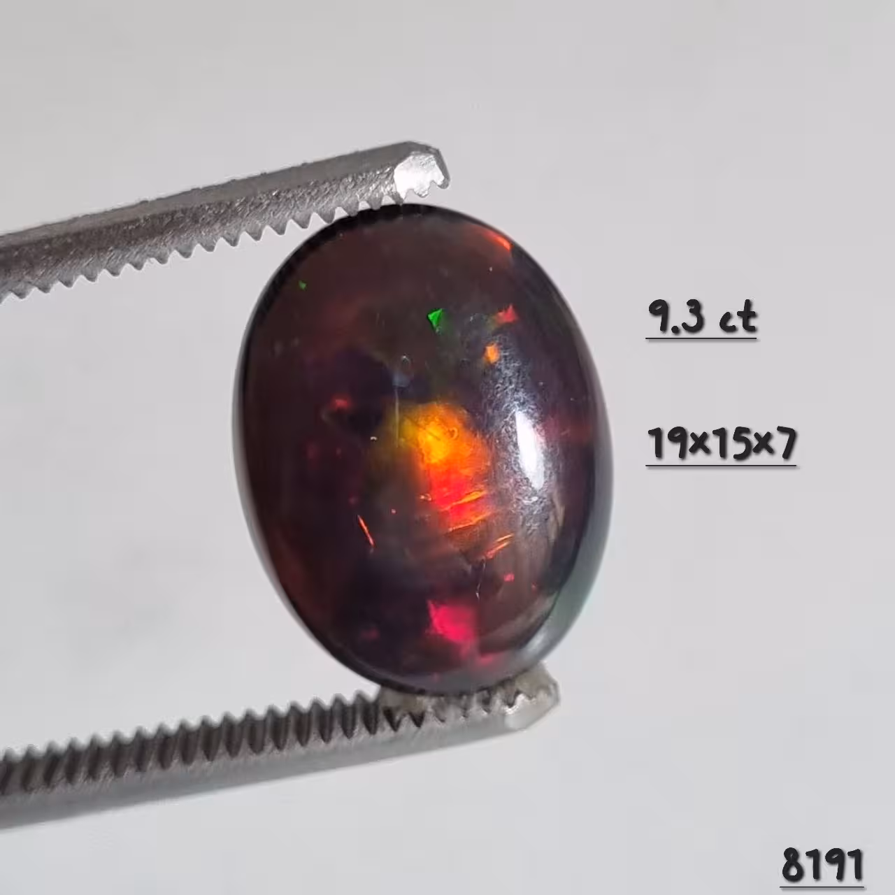 نگین اوپال سیاه اتیوپی هفت رنگ وزن 9.3 قیراط کد 8191