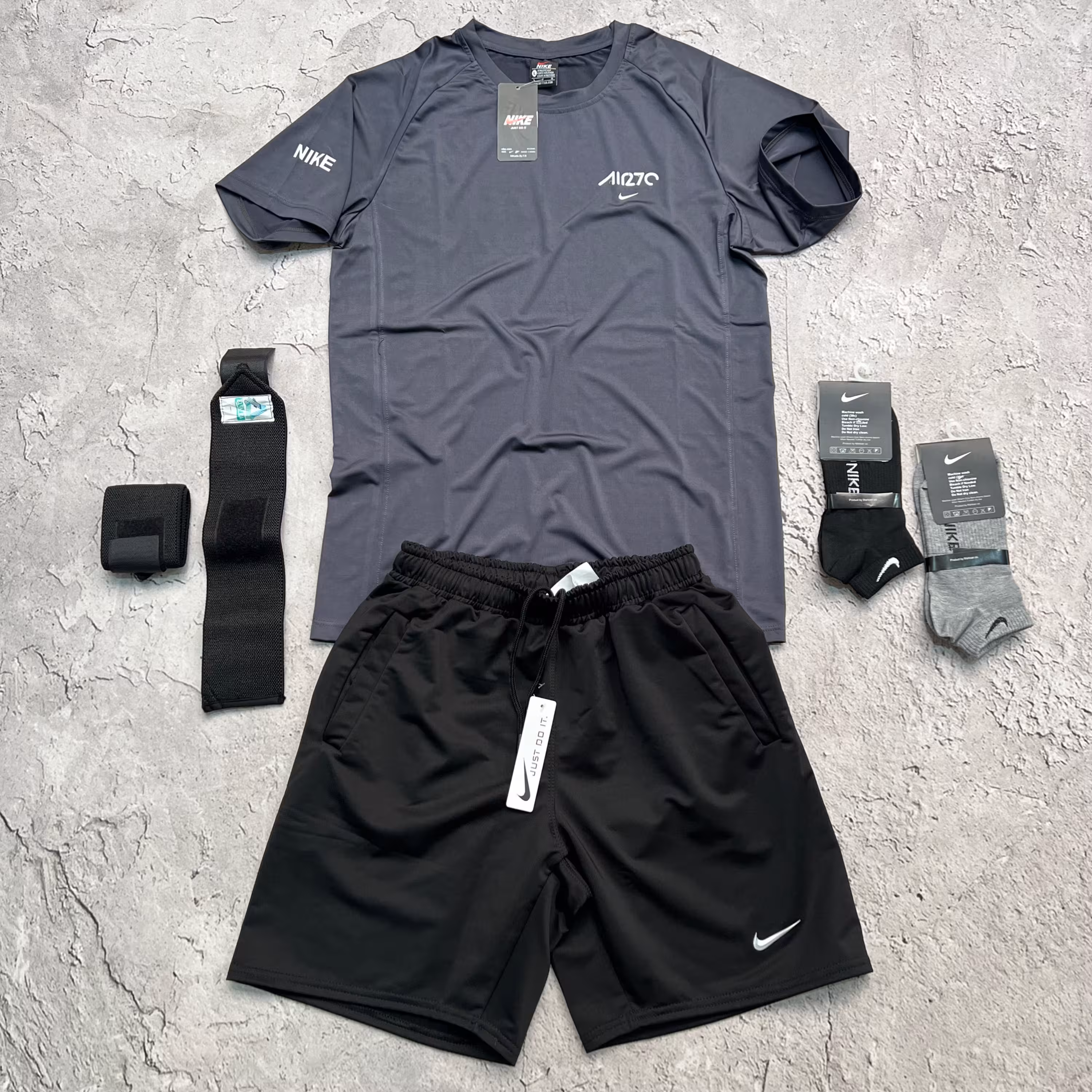 ست تیشرت AIR27 لاکرا کش و شلوارک غواصی چاپ برجسته برندNIKE رنگ نوکمدادی